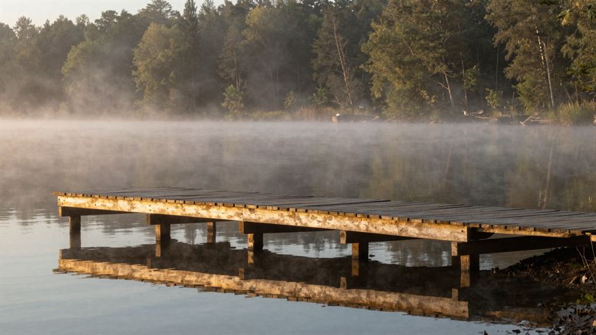 Misty lake at sunrise from the Silver Creek Tackle demo site